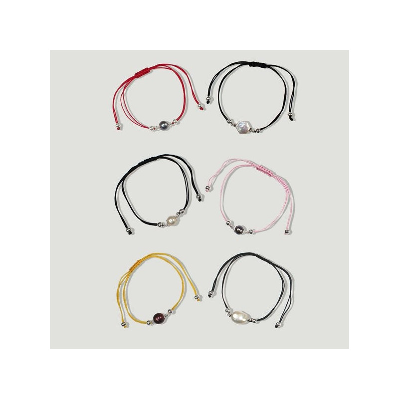 Silver and string bracelet. Pearl Model Silver and string bracelet. Pearl Model