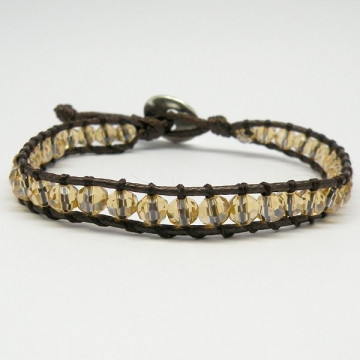 Pulsera cristal facetado con cuerda Dorado. 1 vuel