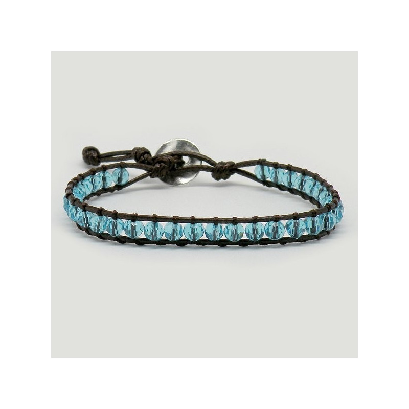 Pulsera cristal facetado Celeste. Cuerda marrón 1 vuelta Pulsera cristal facetado Celeste. Cuerda marrón 1 vuelta