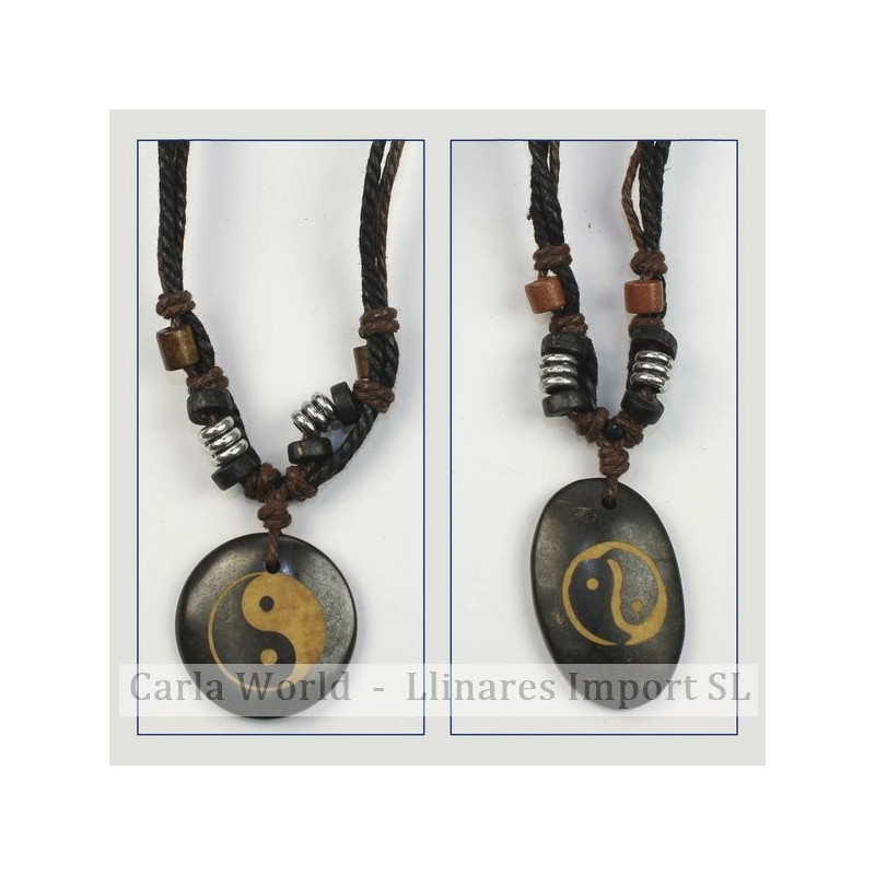 Gancho 19 – Colgante hueso con cordón de nudo corredizo. Modelo ying-yang. Gancho 19 – Colgante hueso con cordón de nudo corredizo. Modelo ying-yang.