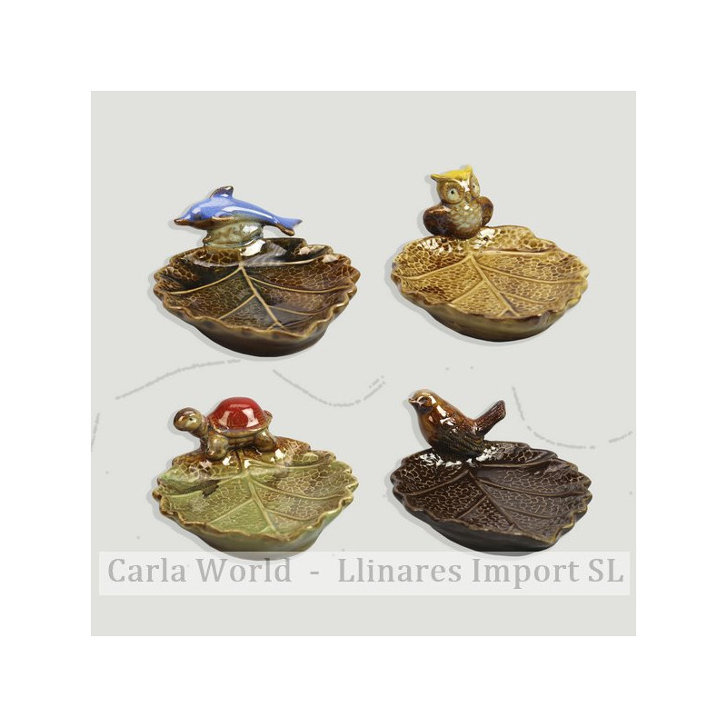 Hoja con animal cerámica. Modelos surtidos. 11x14x6,5cm Hoja con animal cerámica. Modelos surtidos. 11x14x6,5cm