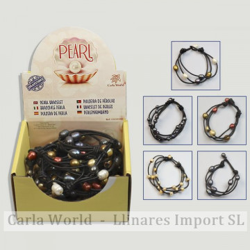 PERLE. Cordon en cuir et bracelet de perles.