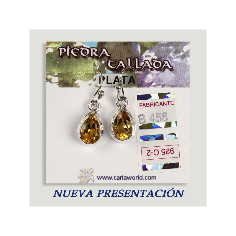 Boucles d'oreilles en argent. citrine sculptée. forme de larme Boucles d'oreilles en argent. citrine sculptée. forme de larme