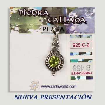 SILVER pendant. Peridot with spiral.
