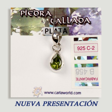 SILVER pendant. carved peridot. Teardrop shapes.