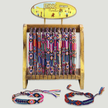 ETHNIC CREATIVE. Thread bracelet.