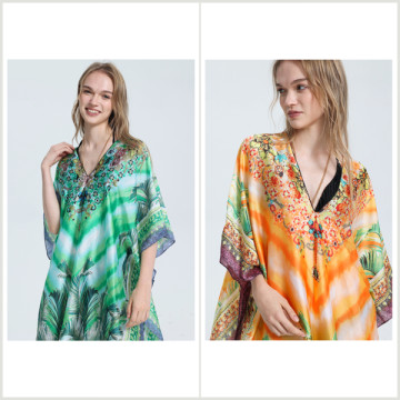 100% Polyester poncho, silky finish. V-shaped neck. One size fits all - 2 colors