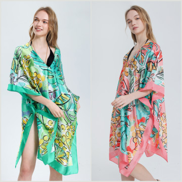 100% Polyester poncho, silky finish. V-shaped neck. One size fits all - 2 colors