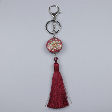 Hook 109 Keychain with varied character and pompom