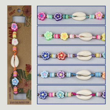 Gancho 92. Pulsera ajustable. Modelo: cypraea y flor