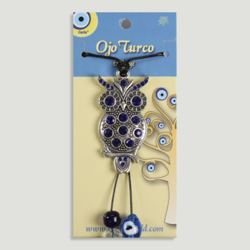 Crochet 68. Pendentif avec cordon. Oeil turc