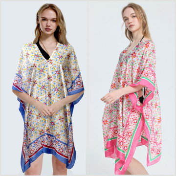 100% Polyester poncho, silky finish. V-shaped neck. One size fits all - 2 colors