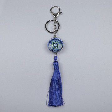 Hook 100 Keychain with varied character and pompom