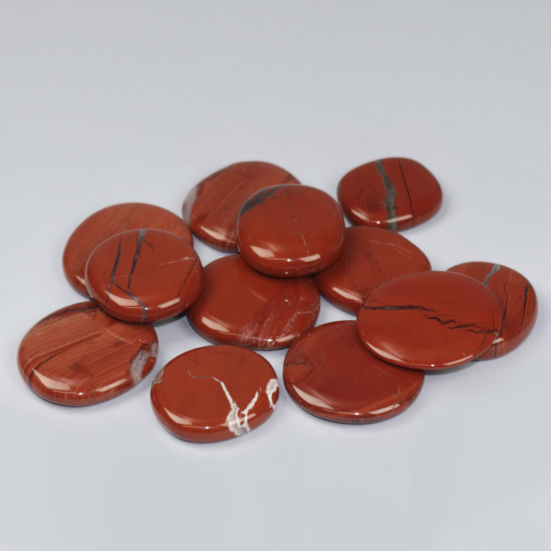 Rodado plano pulido Jaspe rojo 3-4cm aprox. Rodado plano pulido Jaspe rojo 3-4cm aprox.
