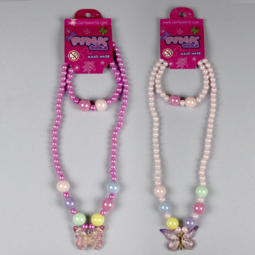 GANCHO 30 - Conjunto collar/pulsera de plástico. Modelo Mariposa