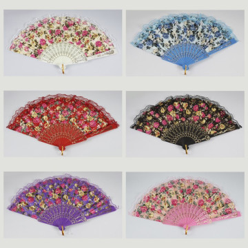 Gancho 51 - Abanico de plástico con diseño de: Flores. Colores surtidos