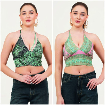 Top polyester réversible. Taille unique / Modèles assortis