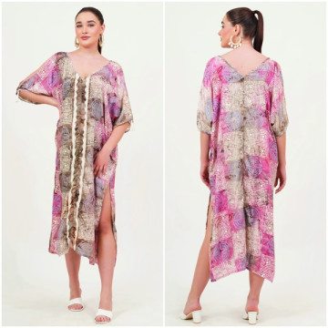 Tunique en polyester. Taille unique / 2 couleurs