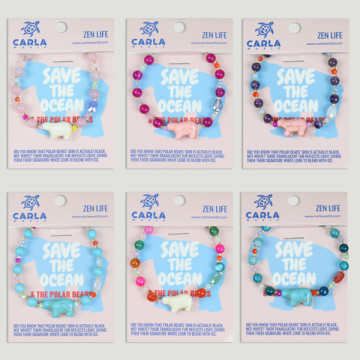 Gancho 10 – Pulsera bola mineral/ágatas con abalorio animal, Oso