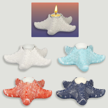 Porta-velas em metal/resina. 16 x 6 cm. aprox. Modelo: Estrela, cores sortidas