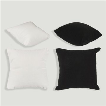 Bracelet/watch cushion. Black/white. Approx. 9 x 10 cm