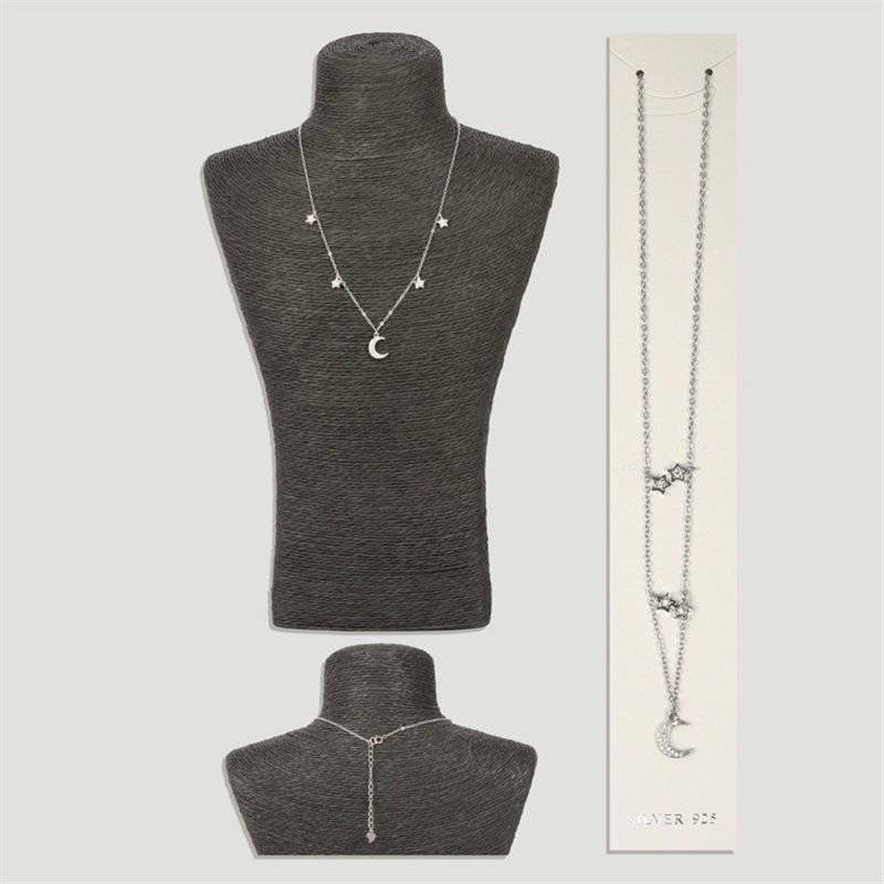 Silver moon and star pendant with cubic zirconia. Chain: 45cm approx. Silver moon and star pendant with cubic zirconia. Chain: 45cm approx.