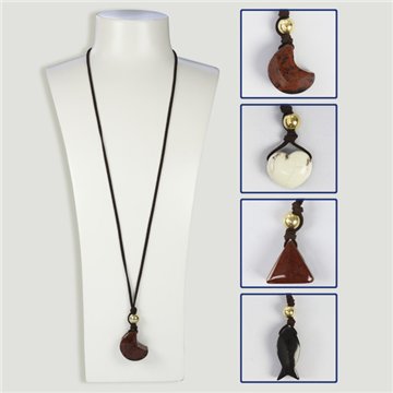 Assorted mineral pendant with gold-plated metal and cord.