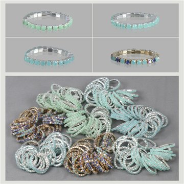 Sparkly elastic ring. Green and turquoise