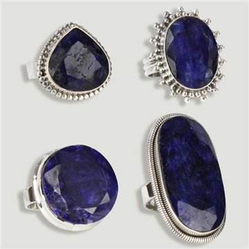 Bague en argent ouvert. Corindon bleu. De 6 à 10gr. (PRIX PAR GRAMME)