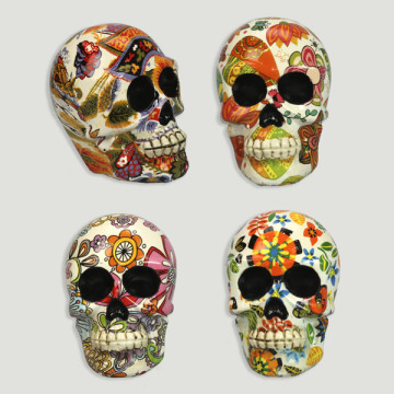 Resin skull. Painted flowers and leaves. Assorted.6x4,5x9cm