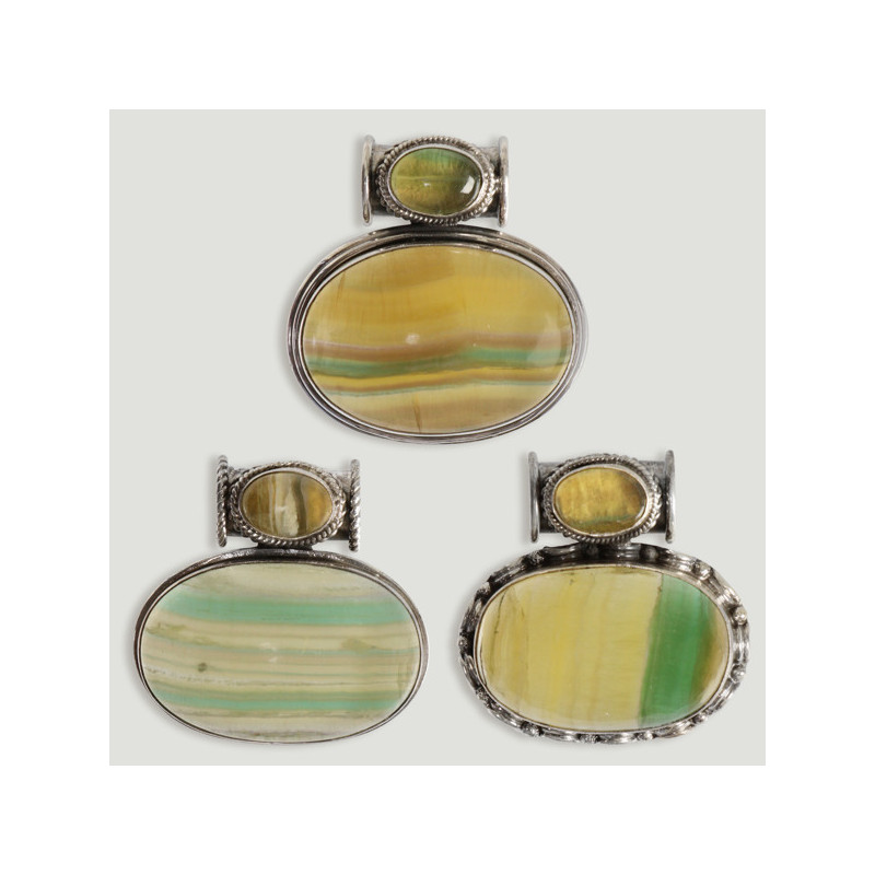 Pendentif en argent. Cabochon de Fluorite double. À partir de 45,80 gr. (PRIX PAR GRAMME) Pendentif en argent. Cabochon de Fluorite double. À partir de 45,80 gr. (PRIX PAR GRAMME)