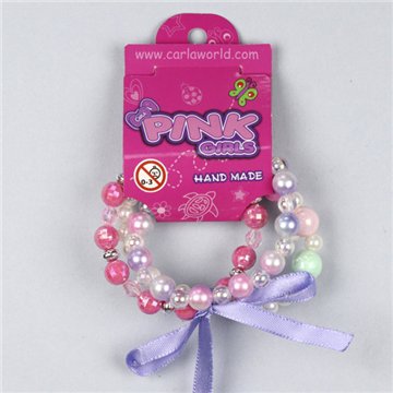 Bracelet nœud. Boules roses. Styles assortis
