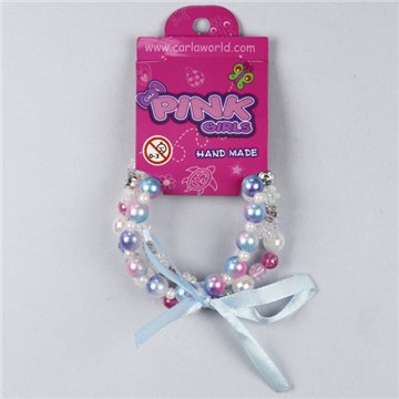 Bracelet nœud. Boules bleues. Styles assortis