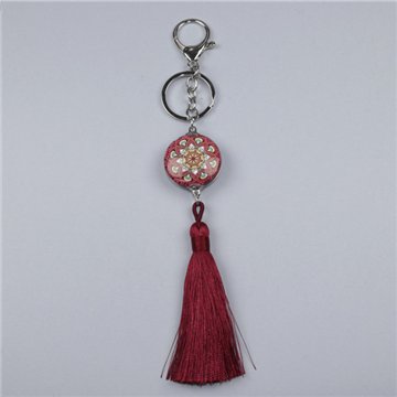 Pom-pom keychain. Red mandala