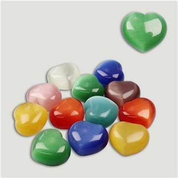 SUBSTITUIÇÃO. I “coração” CIDADE. Mineral: Olho de Gato. 40x45mm