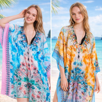 100% Polyester poncho, silky finish. V-shaped neck. One size fits all - 2 colors